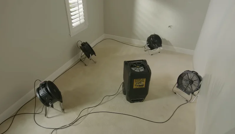 water mitigation Orlando air movers and dehumidifier structural drying equipment in action